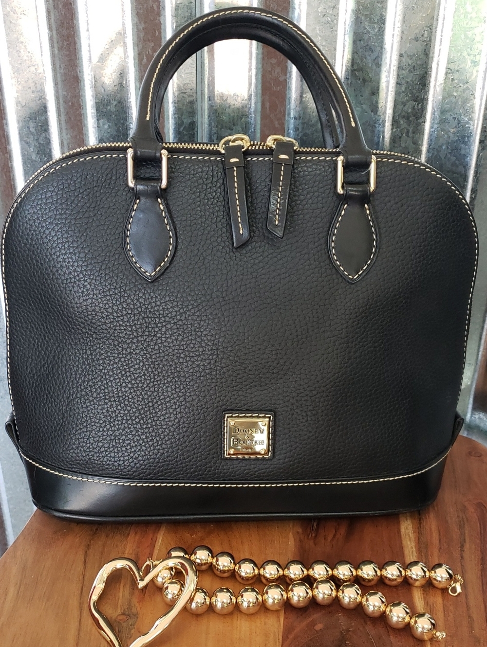 Dooney & Bourke Black Pebbled Leather Satchel with Gold Accents
